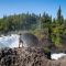 standing at Tanalian Falls in Lake Clark National Park